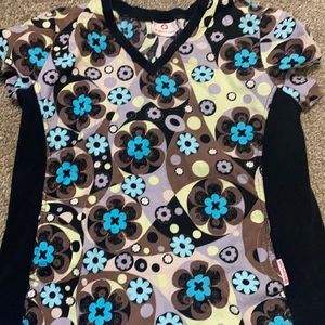 Scrub shirt paid $19.